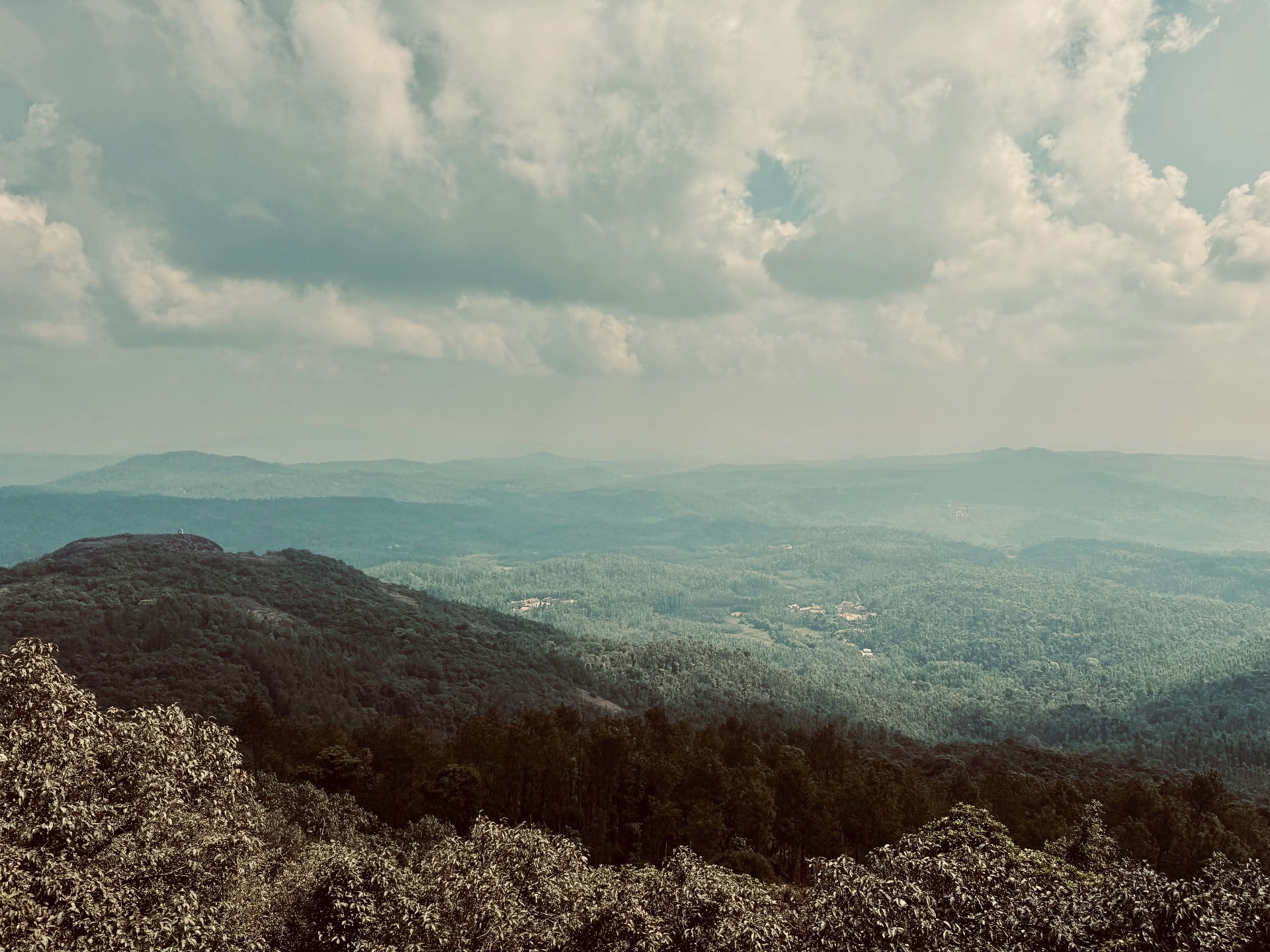 A panoramic view across the ridge, with the estate's holdings folded into the hills.